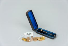 A parcel of mainly nine carat gold cufflinks, 13.5 grms and a horseshoe stickpin with seed pearl