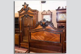 An impressive Biedermeier style two piece bedroom set, French late 19th Century, bevelled glass