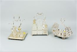 An electroplated six bottle condiment set, an electroplated eggcup set with two of three
