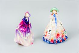 A Royal Doulton china figurine 'Easter Day' HN2039 (hairline crack to the base) and a Royal