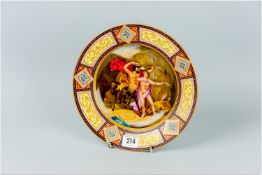 A Vienna porcelain cabinet plate having a central painted panel of mythological men finely