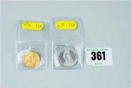 An 1887 50th Jubilee Victoria half sovereign and an 1887 sterling silver shilling