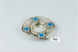 A circular Arts & Crafts style silver dish holder with four blue enamel floral roundels, 4.3 ozs
