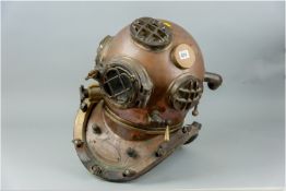 A US Navy deep sea copper and brass diving helmet having a plaque on the breastplate 'US Navy Diving