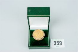 A full gold sovereign 1908 in a nine carat gold mount, 19 grms total