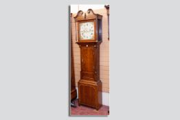 A late 18th Century oak longcase clock having a twin weight driven movement striking on a bell set