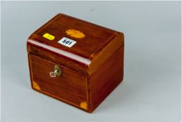 An Edwardian mahogany dome topped tea caddy with a single boxwood string inlay and Sheraton style
