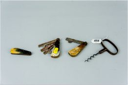 An early iron corkscrew and three horn and metal animal blood-letting knives, maker's mark to some