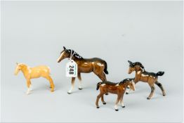 Four various Beswick models of foals, assorted colour, sizes and poses