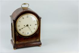 A Regency mahogany cased bracket clock with twin fusee repeater movement striking on a bell, the