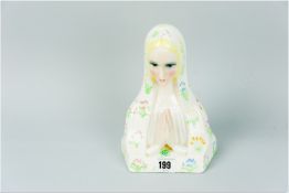 A Lenci head and shoulders model of the Madonna having a solemn hand painted face and clasped hands,