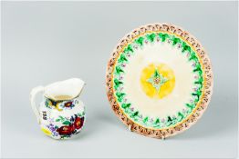 A circular Wedgwood Majolica bread plate with pierced border, impressed Wedgwood to the base and