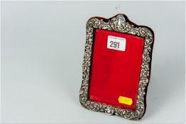 A scrolled silver easel picture frame to take a picture 5 x 3.5 ins (12.5 x 9 cms), Birmingham 1900