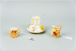 A Royal Worcester ivory ground vase of squat form with segmented neck having floral and insect