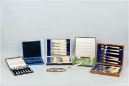 Two cased sets of bone handled fish knives and forks, two cased sets of six electroplated cake forks