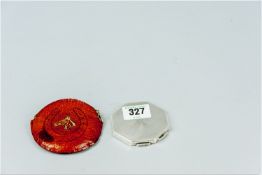 A silver octagonal engine turned powder compact, 1.8 ozs, Birmingham 1939