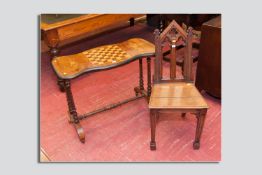 A kidney shaped inlaid chequer topped side table with twist supports and stretcher on arched feet