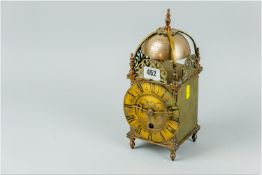 An early 20th Century brass lantern clock by 'Astral, Coventry', a single wind spring movement