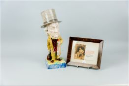 A good Staffordshire pottery caricature figure of Gladstone holding a bag and umbrella, having an