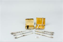 Two silver cigarette cases, 5.5 ozs and six silver handled fruit knives