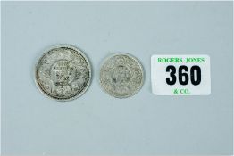 A silver rupee 1916 and a silver half rupee 1921
