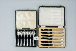 Six cased silver coffee spoons, Chester 1941 and a cased set of six silver handled fruit knives,