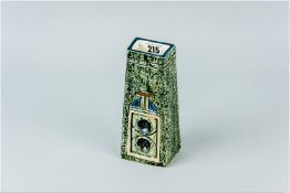 A Troika coffin shaped vase having an all over textured body with impressed Aztec style patterns