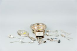A parcel of mixed silver cutlery, mainly spoons, 10 ozs total, a silver backed oval hand mirror