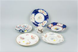 A group of hand decorated Coalport wall plates and an early Coalport coffee can 2.75 x 2.5 ins (7