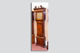 A good quality mahogany longcase clock having a square brass dial with silvered Roman numeral