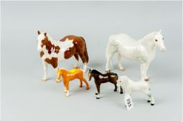 A Beswick horse titled 'Connemara' (chip to ear, damage to one leg), a Beswick pinto pony (chips and