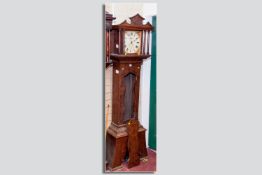 A pollard oak European longcase clock, painted dial with Roman numerals, subsidiary seconds and date