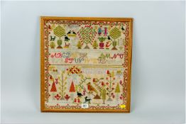 A framed woolwork sampler dated 1872 by Mary Ann Rowlands, Aged 10, March 12th, having a nice