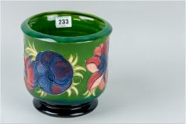 A Moorcroft 'Clematis' jardinière, green ground leading down to a deep cobalt colour base with