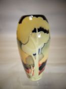 A Moorcroft pottery baluster vase in the 'Eventide Winter' pattern, 7.5 ins high (19 cms)