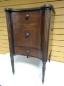 An early-twentieth century stained night-cabinet of concave-form, with reeded full column supports