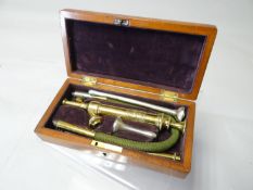 A cased Mawson Thompson brass irrigation set