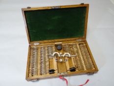 F Davidson & Co cased set of opticians testing glasses
