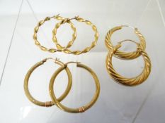 Three pairs of 9ct yellow gold hoop earrings, 8.8gms total