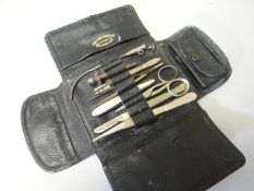 Minor operations kit in leather wallet together with lancet set