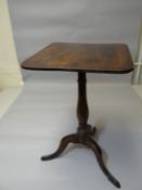 A small mahogany square topped tripod table