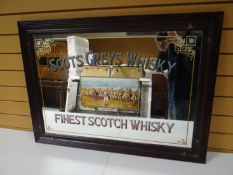 A public house advertising mirror for 'Scots Greys Whisky' in a reeded frame, 37 x 27 ins (94 x 68