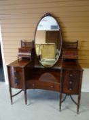 A late nineteenth century mahogany dressing-table by Maple & Co, (to match Lots, 23, 24, 25 & 27)