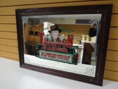 A public house advertising mirror for 'Taunton Cider' in a reeded frame, 37 x 27 ins (94 x 69 cms)