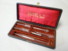 A cased Hausman & Co sinus set