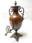 A heavy quality twin handled ovoid samovar with cylindrical neck, naturalistic knop to the lid and