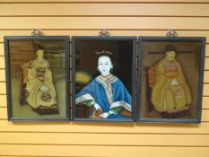 A trio of framed Chinese portraits of courtesans wearing traditional decorative clothing, believed
