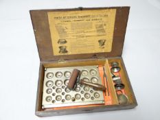 A pharmaceutical 'closing' machine in a wooden box