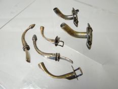 A parcel of child's tracheostomy tubes incl. silver examples