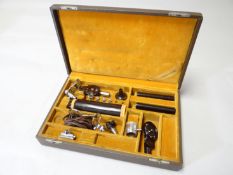 A cased physicians bakelite diagnostic set by National Electric Instruments, USA together with
